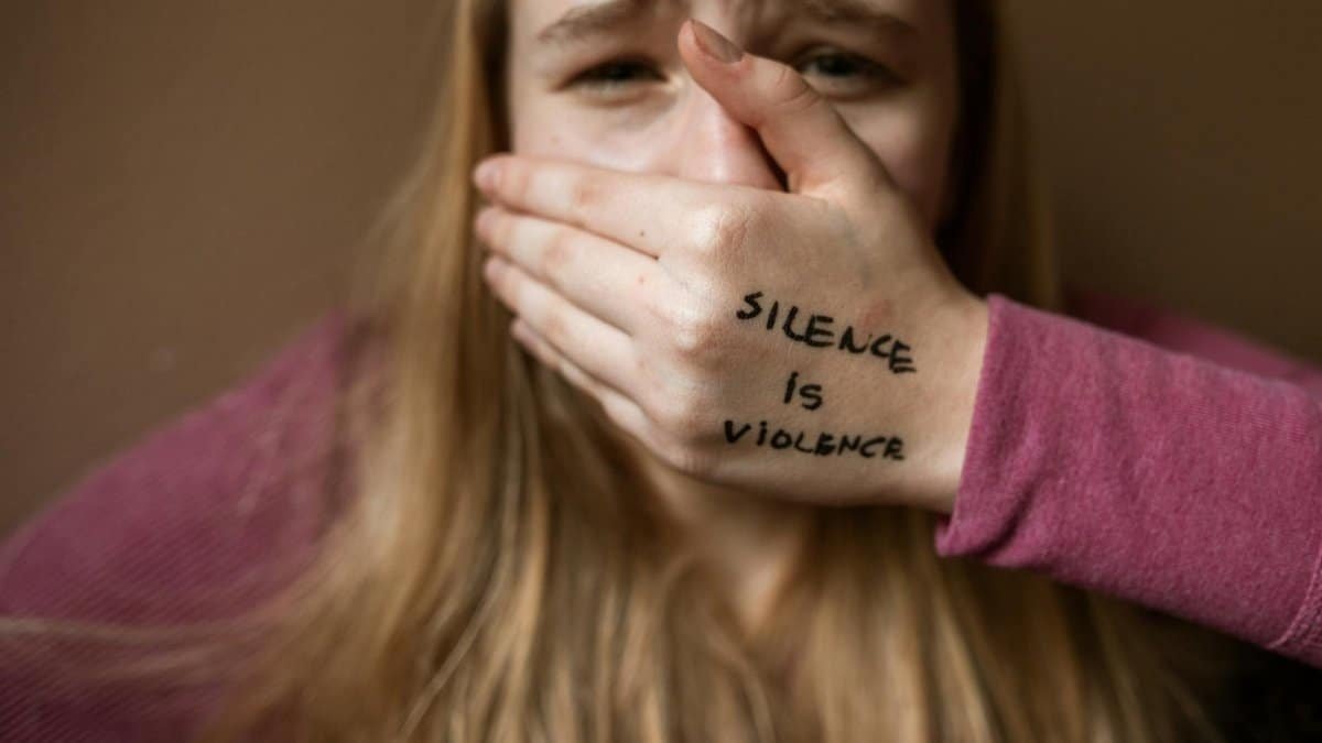 Powerful image highlighting the message 'Silence is Violence' to raise awareness on social issues.