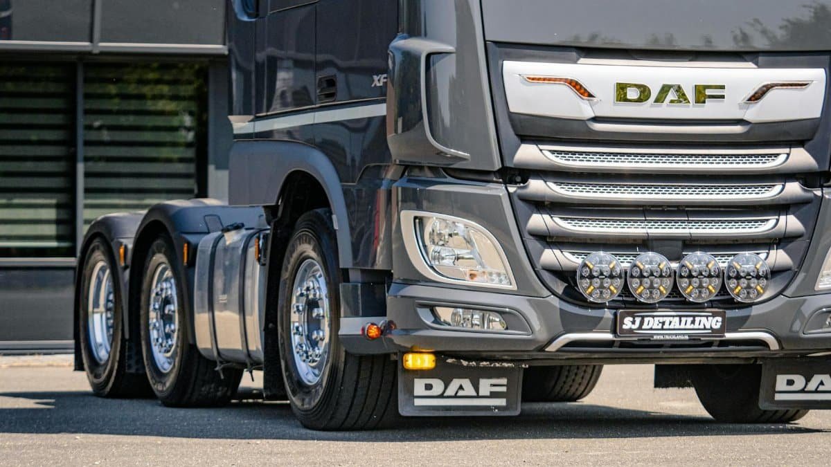 A highly detailed DAF truck parked outdoors in Andijk, Noord-Holland. Captures modern automotive design.