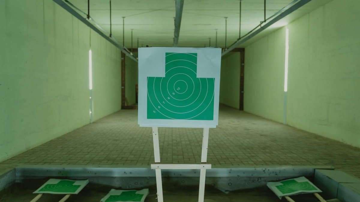 A green target at an indoor shooting range, ideal for aiming practice.