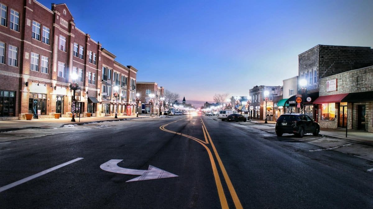 A serene twilight view of Main Street in Emporia, Kansas showcasing urban architecture.