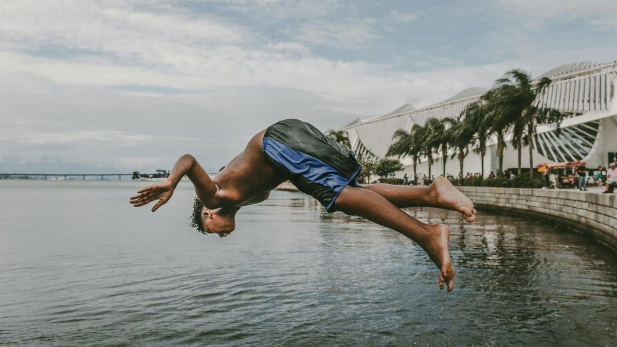Energetic leap into water at the Museum of Tomorrow, Rio de Janeiro, Brazil.