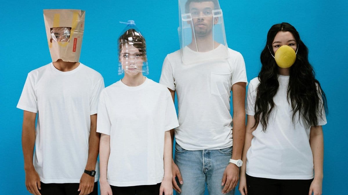 Humorous depiction of people wearing DIY masks as protection during pandemic.