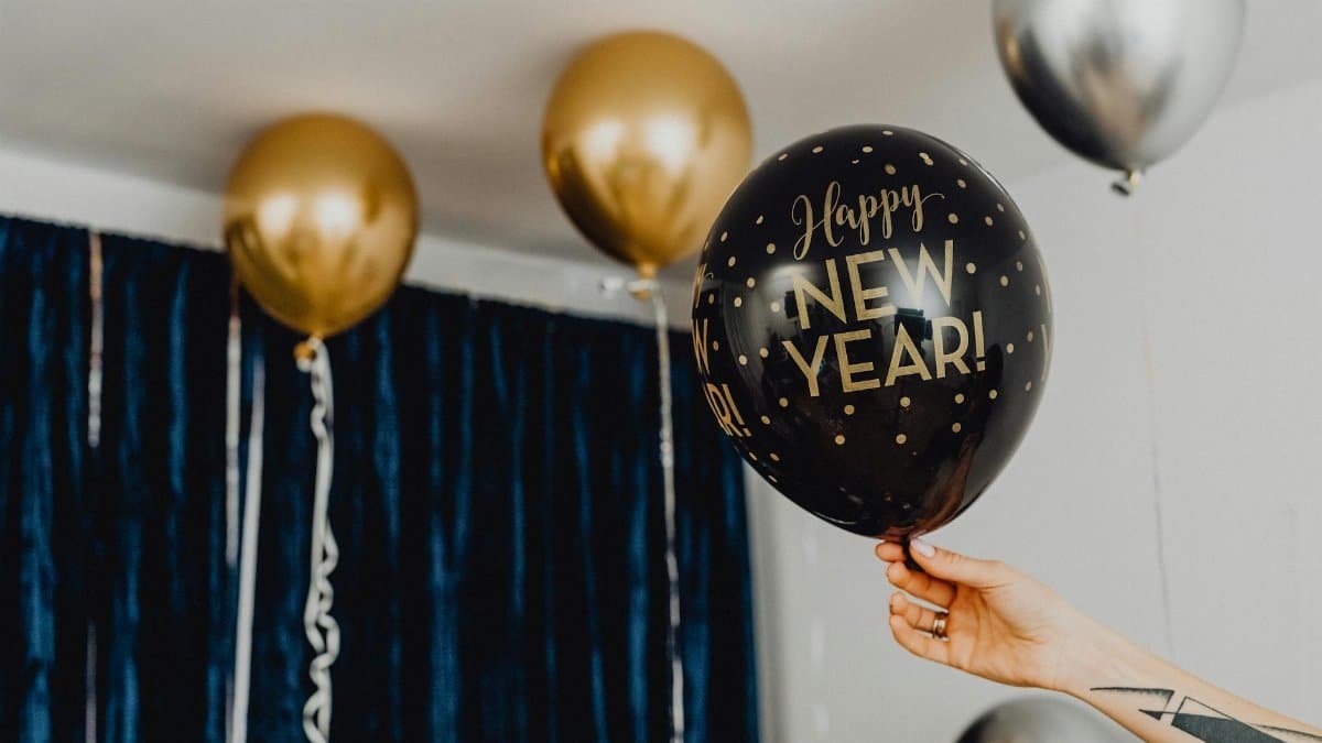 Close-up of festive New Year balloons in a room, perfect for party celebrations.
