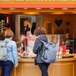 Visitors at Maison Alsacienne de Biscuiterie in Colmar, enjoying local pastries.