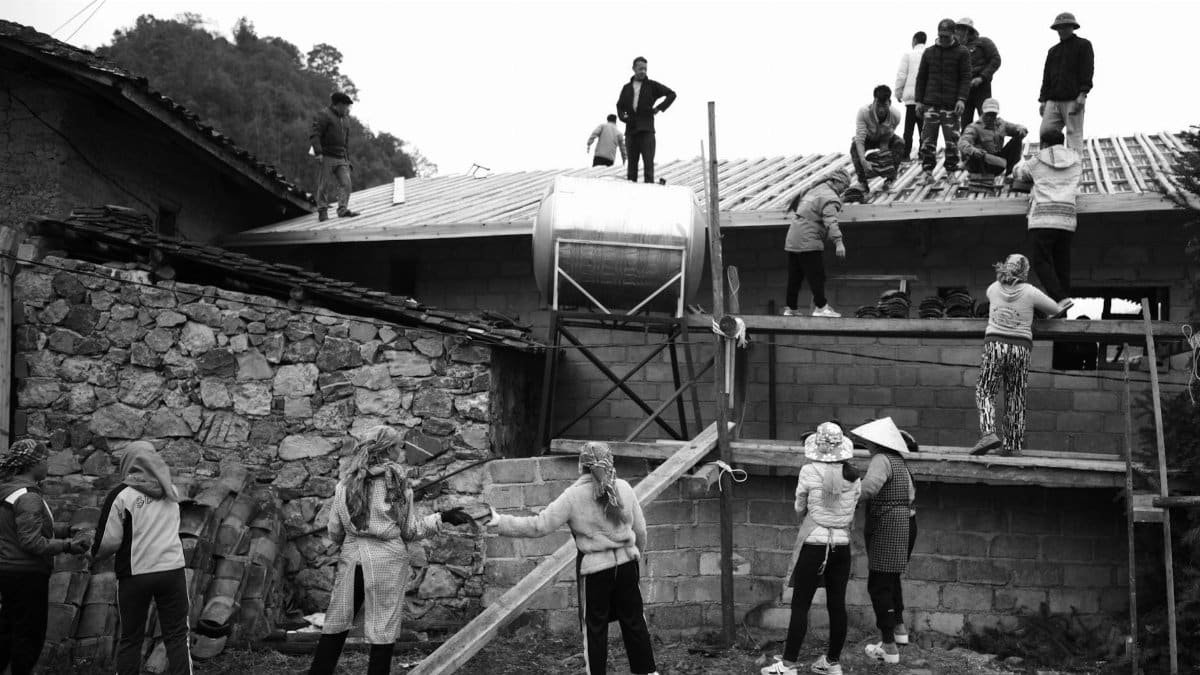 Local villagers collaborate in constructing a rural building in Hà Giang, Vietnam.