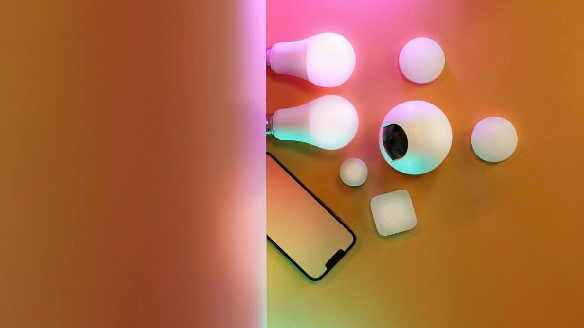 A flat lay of smart bulbs and devices, creating a vibrant tech ambiance.