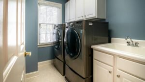 A clean, organized laundry room featuring modern appliances and ample storage.