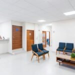 Bright and clean medical waiting room with modern seating and decor.