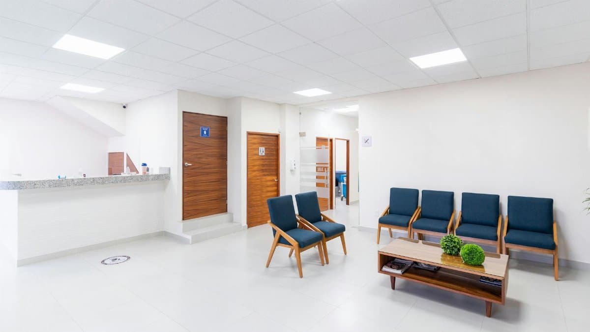 Bright and clean medical waiting room with modern seating and decor.