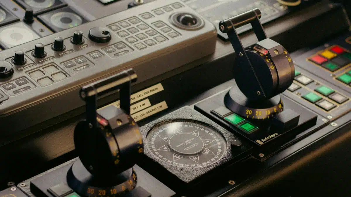 Detailed view of a sophisticated control panel featuring levers, buttons, and compass.