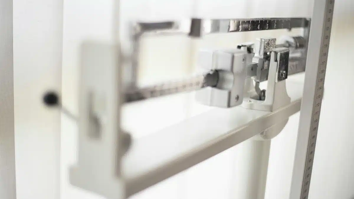 Detailed view of a classic mechanical balance scale, offering precision in weight measurement.