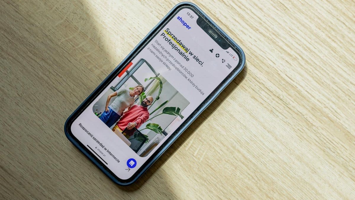 Smartphone displaying an ecommerce website. Optimize online sales and presence.