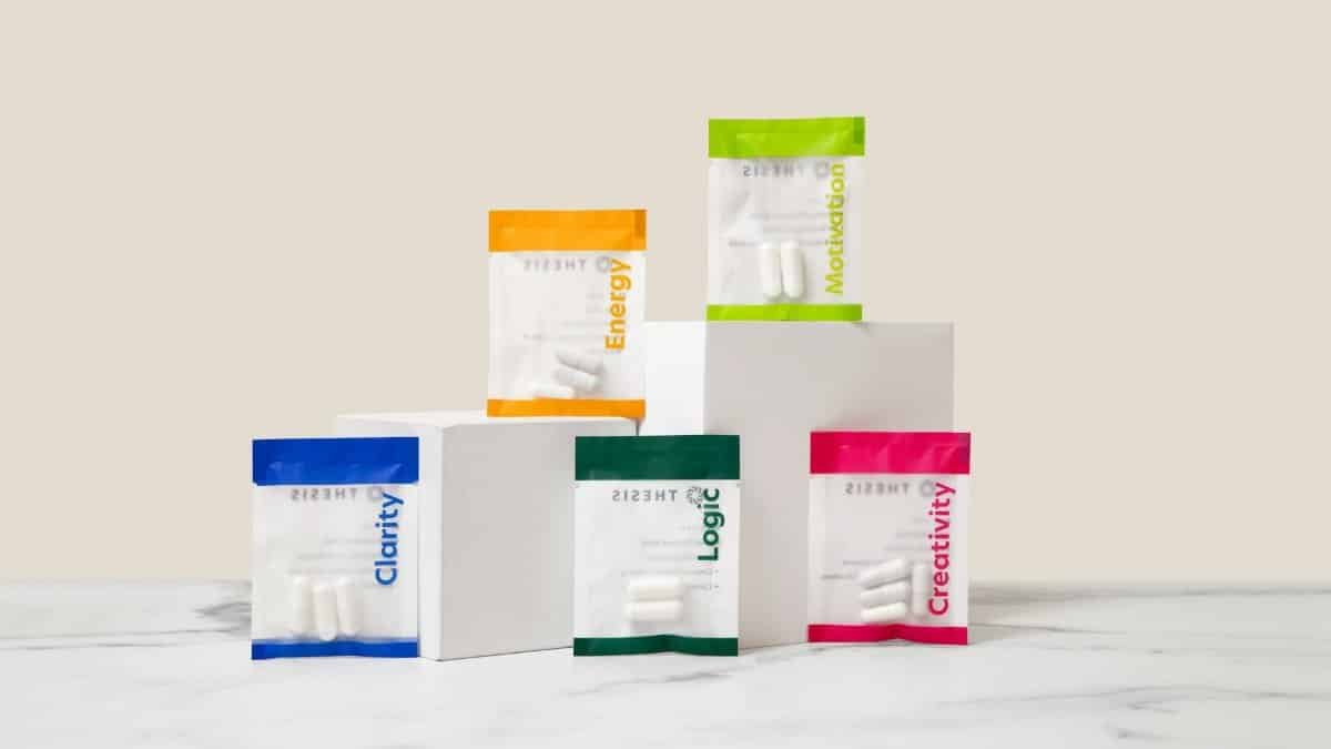 Vibrant display of nootropic supplements showcasing energy, motivation, creativity, and clarity on white blocks.