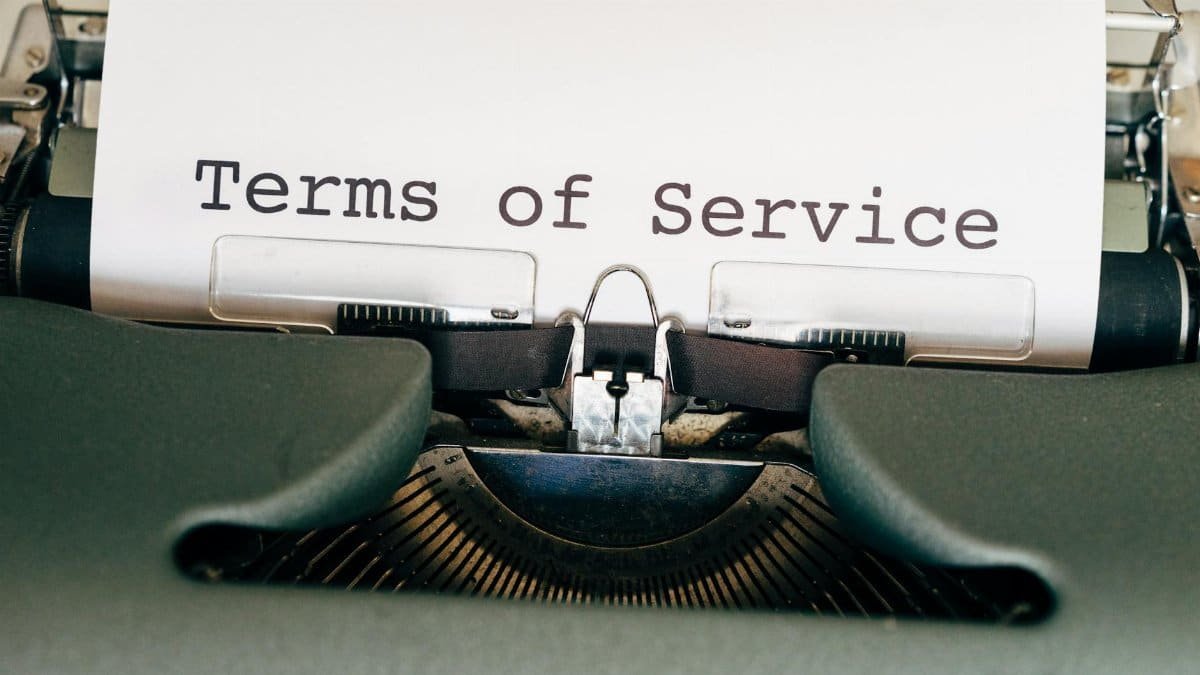 A vintage typewriter with a paper displaying 'Terms of Service'. Perfect for business or legal themes.